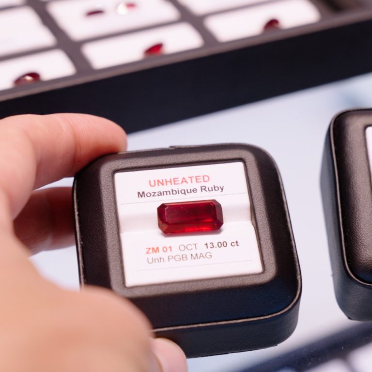 A 13 carat unheated Mozambique ruby in a labelled gem box