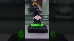 An Argyle pink diamond ring worth about $350,000 on a display stand, shown by RR Diamonds