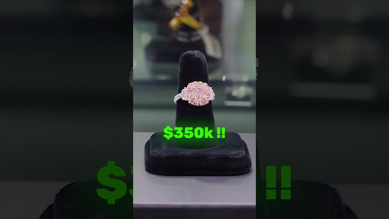 An Argyle pink diamond ring worth about $350,000 on a display stand, shown by RR Diamonds