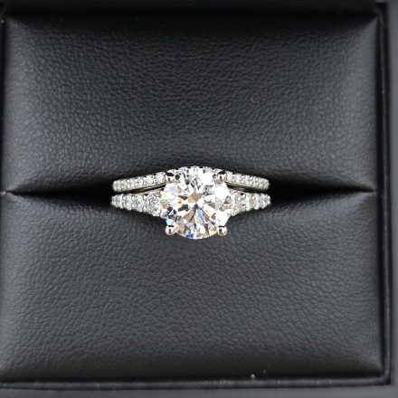 The Appleton Engagement Ring, a 2.5 carat D colour VVS round diamond on a band of graduated diamonds, with a matching contoured diamond wedding band