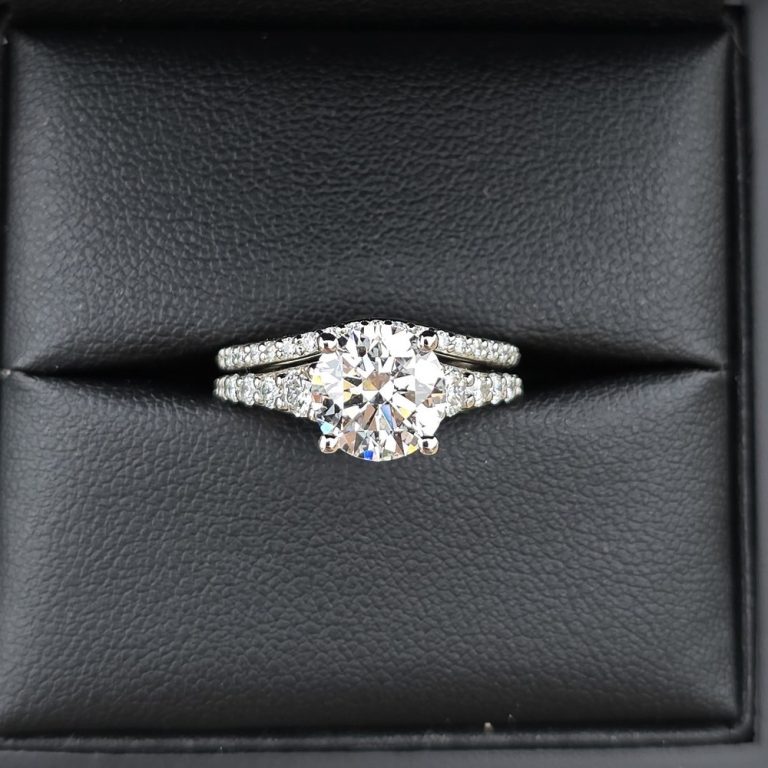 Diamond engagement ring and wedding band in a black ring box