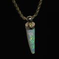 Mihi's Opal Belemnite, a belemnite opal from Coober Pedy in a handmade 18ct gold setting